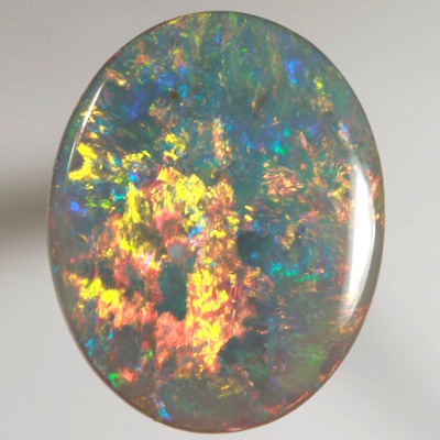 SOLID SEMI BLACK OPAL Top quality. Floral Harlequin pattern, neon orange and yellow with red SEE VIDEO  
